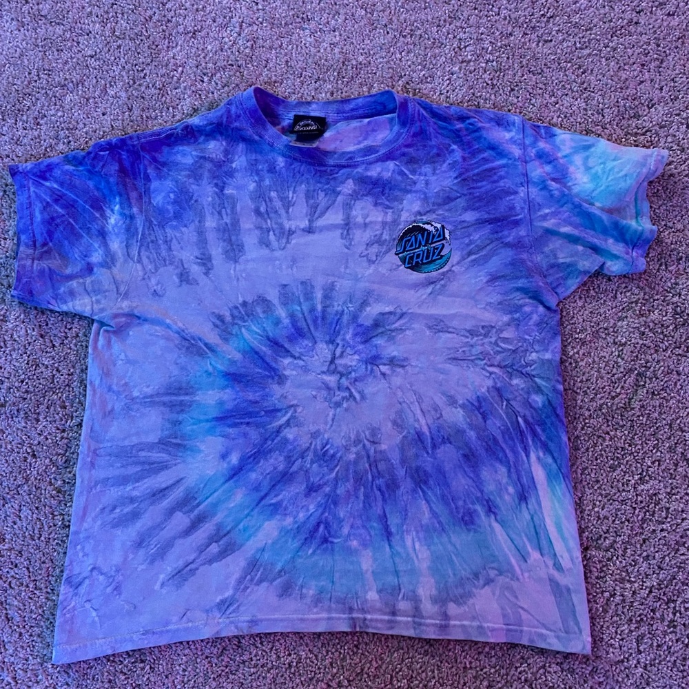 Mostly blue tie dye shirt, worn when it fit but not now.